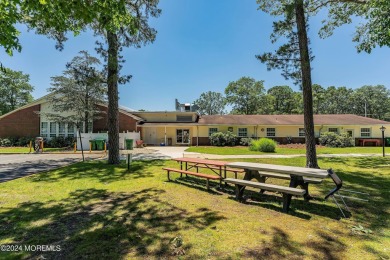 Nestled in the heart of Leisure Village, this updated home on Greenbriar Woodlands in New Jersey - for sale on GolfHomes.com, golf home, golf lot