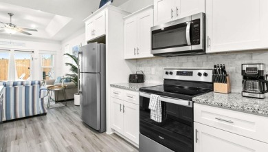 Located 1/2 MILE from sugar white sand beaches and pristine on Sharks Tooth Golf Club in Florida - for sale on GolfHomes.com, golf home, golf lot