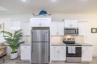 Located 1/2 MILE from sugar white sand beaches and pristine on Sharks Tooth Golf Club in Florida - for sale on GolfHomes.com, golf home, golf lot