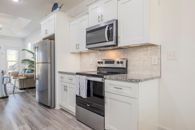 Located 1/2 MILE from sugar white sand beaches and pristine on Sharks Tooth Golf Club in Florida - for sale on GolfHomes.com, golf home, golf lot
