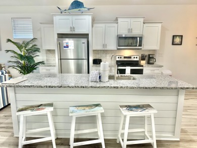Located 1/2 MILE from sugar white sand beaches and pristine on Sharks Tooth Golf Club in Florida - for sale on GolfHomes.com, golf home, golf lot