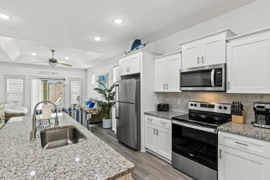 Located 1/2 MILE from sugar white sand beaches and pristine on Sharks Tooth Golf Club in Florida - for sale on GolfHomes.com, golf home, golf lot