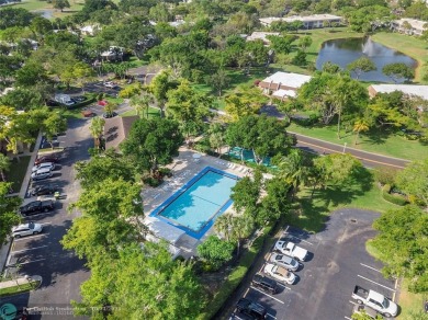 COMPLETE DECORATOR REMODELED THREE BEDROOM SPLIT PLAN, TWO FULL on Oaks Country Club in Florida - for sale on GolfHomes.com, golf home, golf lot