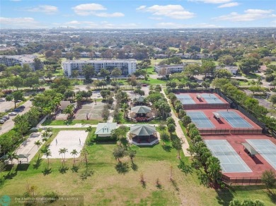 COMPLETE DECORATOR REMODELED THREE BEDROOM SPLIT PLAN, TWO FULL on Oaks Country Club in Florida - for sale on GolfHomes.com, golf home, golf lot