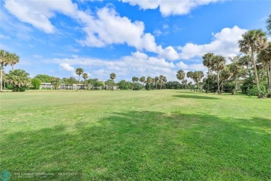 COMPLETE DECORATOR REMODELED THREE BEDROOM SPLIT PLAN, TWO FULL on Oaks Country Club in Florida - for sale on GolfHomes.com, golf home, golf lot