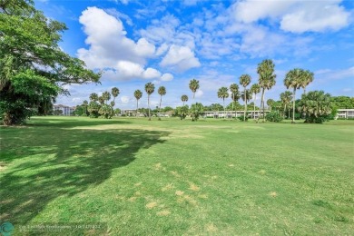 COMPLETE DECORATOR REMODELED THREE BEDROOM SPLIT PLAN, TWO FULL on Oaks Country Club in Florida - for sale on GolfHomes.com, golf home, golf lot