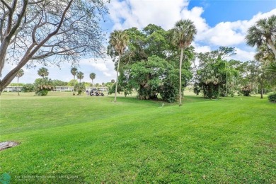 COMPLETE DECORATOR REMODELED THREE BEDROOM SPLIT PLAN, TWO FULL on Oaks Country Club in Florida - for sale on GolfHomes.com, golf home, golf lot