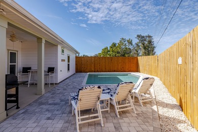 Located 1/2 MILE from sugar white sand beaches and pristine on Sharks Tooth Golf Club in Florida - for sale on GolfHomes.com, golf home, golf lot