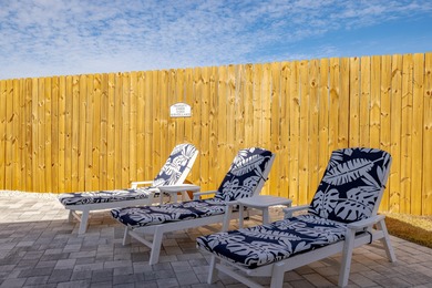 Located 1/2 MILE from sugar white sand beaches and pristine on Sharks Tooth Golf Club in Florida - for sale on GolfHomes.com, golf home, golf lot
