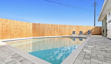 Located 1/2 MILE from sugar white sand beaches and pristine on Sharks Tooth Golf Club in Florida - for sale on GolfHomes.com, golf home, golf lot