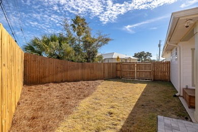 Located 1/2 MILE from sugar white sand beaches and pristine on Sharks Tooth Golf Club in Florida - for sale on GolfHomes.com, golf home, golf lot