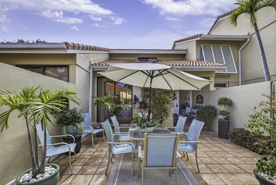 Set on the world-famous PGA Fazio course, this spacious on PGA National Golf Club in Florida - for sale on GolfHomes.com, golf home, golf lot