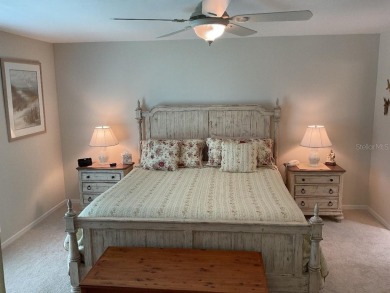 BEAUTIFULLY RENOVATED HURRICANE IMPACT WINDOWS NEW TRAVERTINE on Plantation Golf and Country Club in Florida - for sale on GolfHomes.com, golf home, golf lot