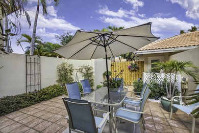 Set on the world-famous PGA Fazio course, this spacious on PGA National Golf Club in Florida - for sale on GolfHomes.com, golf home, golf lot