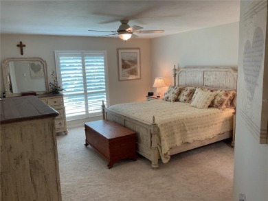 BEAUTIFULLY RENOVATED HURRICANE IMPACT WINDOWS NEW TRAVERTINE on Plantation Golf and Country Club in Florida - for sale on GolfHomes.com, golf home, golf lot
