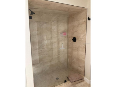 BEAUTIFULLY RENOVATED HURRICANE IMPACT WINDOWS NEW TRAVERTINE on Plantation Golf and Country Club in Florida - for sale on GolfHomes.com, golf home, golf lot