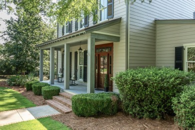 Nestled behind the private gates of Champions Retreat in on Champions Retreat Golf Club in Georgia - for sale on GolfHomes.com, golf home, golf lot