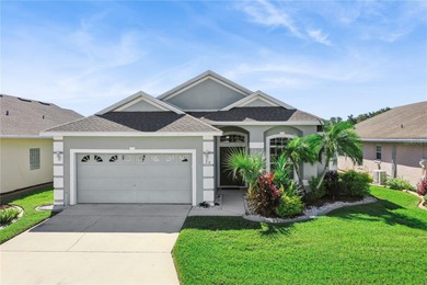 This stunning home is the perfect example of Florida retirement on Ridgewood Lakes Golf and Country Club in Florida - for sale on GolfHomes.com, golf home, golf lot