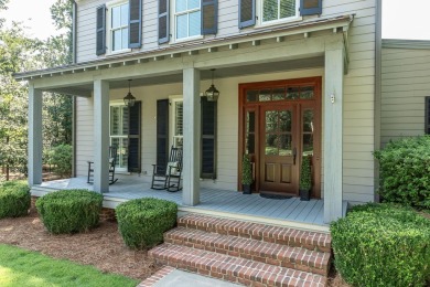 Nestled behind the private gates of Champions Retreat in on Champions Retreat Golf Club in Georgia - for sale on GolfHomes.com, golf home, golf lot