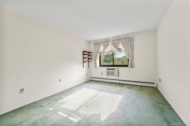 Commuter's dream with assigned garage parking! Large 2 bedrooms on Scarsdale Golf Club in New York - for sale on GolfHomes.com, golf home, golf lot