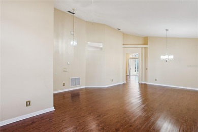 This stunning home is the perfect example of Florida retirement on Ridgewood Lakes Golf and Country Club in Florida - for sale on GolfHomes.com, golf home, golf lot