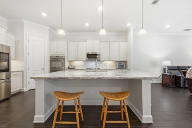 Tucked Along A Quiet Street In The Highly Sought After Community on The Palencia Club in Florida - for sale on GolfHomes.com, golf home, golf lot