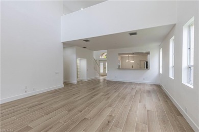 Fully Remodeled Lakeside Luxury in Troon Lakes at Pelican Marsh
 on Pelican Marsh Golf Club in Florida - for sale on GolfHomes.com, golf home, golf lot
