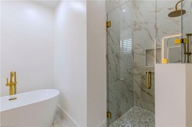Fully Remodeled Lakeside Luxury in Troon Lakes at Pelican Marsh
 on Pelican Marsh Golf Club in Florida - for sale on GolfHomes.com, golf home, golf lot