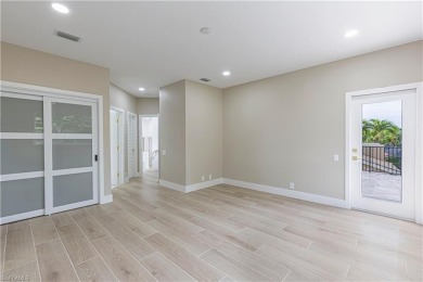 Fully Remodeled Lakeside Luxury in Troon Lakes at Pelican Marsh
 on Pelican Marsh Golf Club in Florida - for sale on GolfHomes.com, golf home, golf lot