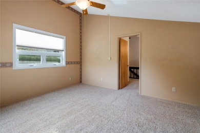 Check out this perfectly located 2 bedroom/2 bathroom unit, with on Polson Bay Golf Course - Championship Course in Montana - for sale on GolfHomes.com, golf home, golf lot