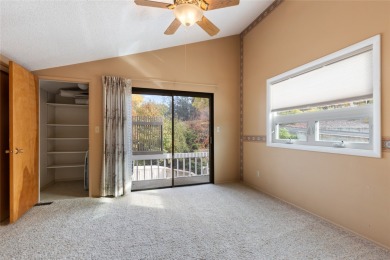 Check out this perfectly located 2 bedroom/2 bathroom unit, with on Polson Bay Golf Course - Championship Course in Montana - for sale on GolfHomes.com, golf home, golf lot