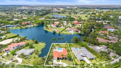 Discover lakeside serenity in this captivating Saddie Club on Bonaventure Country Club in Florida - for sale on GolfHomes.com, golf home, golf lot