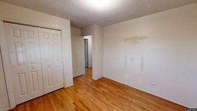 Welcome to this beautiful 3-bedroom, 2-bath tri-level located on on Paradise Valley Country Club in Wyoming - for sale on GolfHomes.com, golf home, golf lot