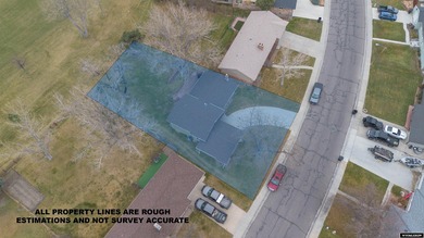 Welcome to this beautiful 3-bedroom, 2-bath tri-level located on on Paradise Valley Country Club in Wyoming - for sale on GolfHomes.com, golf home, golf lot