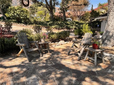 Tucked along the quiet greens of San Dimas Canyon Golf Course on San Dimas Canyon Golf Course in California - for sale on GolfHomes.com, golf home, golf lot