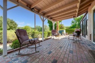 Tucked along the quiet greens of San Dimas Canyon Golf Course on San Dimas Canyon Golf Course in California - for sale on GolfHomes.com, golf home, golf lot
