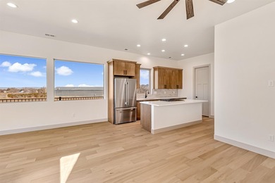 Brand new construction backing directly to the beautiful Chipeta on Chipeta Golf Course At Orchard Mesa in Colorado - for sale on GolfHomes.com, golf home, golf lot