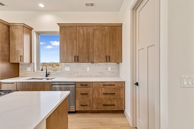 Brand new construction backing directly to the beautiful Chipeta on Chipeta Golf Course At Orchard Mesa in Colorado - for sale on GolfHomes.com, golf home, golf lot