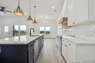Welcome to 236 Peter Kleid Loop, a beautifully designed on Vaaler Creek Golf Club in Texas - for sale on GolfHomes.com, golf home, golf lot
