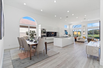 Stunningly renovated home located on two fairways of the Eagle on TPC Eagle Trace in Florida - for sale on GolfHomes.com, golf home, golf lot