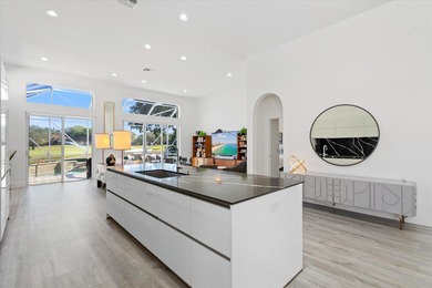 Stunningly renovated home located on two fairways of the Eagle on TPC Eagle Trace in Florida - for sale on GolfHomes.com, golf home, golf lot