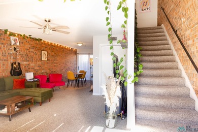 This unique loft-style townhome is a true knockout, offering on Chaparral Country Club in New Mexico - for sale on GolfHomes.com, golf home, golf lot