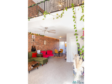 This unique loft-style townhome is a true knockout, offering on Chaparral Country Club in New Mexico - for sale on GolfHomes.com, golf home, golf lot