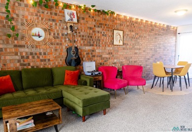 This unique loft-style townhome is a true knockout, offering on Chaparral Country Club in New Mexico - for sale on GolfHomes.com, golf home, golf lot