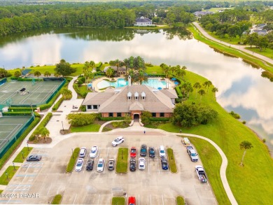 Welcome to your dream home in the highly sought-after gated golf on Plantation Bay Golf and Country Club in Florida - for sale on GolfHomes.com, golf home, golf lot