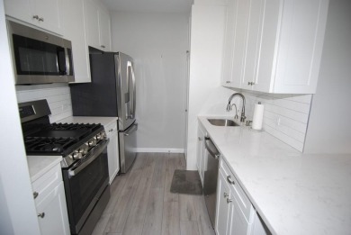Welcome to North Shore Towers--where luxury living meets on Towers Country Club in New York - for sale on GolfHomes.com, golf home, golf lot