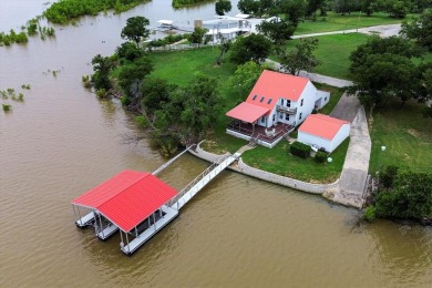 This beautiful lakefront home boasts of 2,605 sf of space on The Club At Runaway Bay in Texas - for sale on GolfHomes.com, golf home, golf lot