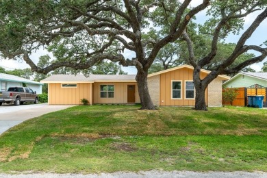 Nestled in the sought-after Little Bay Subdivision, this on Rockport Country Club in Texas - for sale on GolfHomes.com, golf home, golf lot