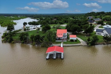 This beautiful lakefront home boasts of 2,605 sf of space on The Club At Runaway Bay in Texas - for sale on GolfHomes.com, golf home, golf lot