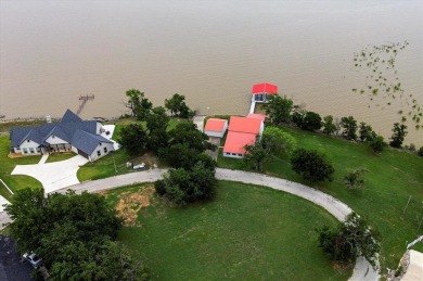 This beautiful lakefront home boasts of 2,605 sf of space on The Club At Runaway Bay in Texas - for sale on GolfHomes.com, golf home, golf lot